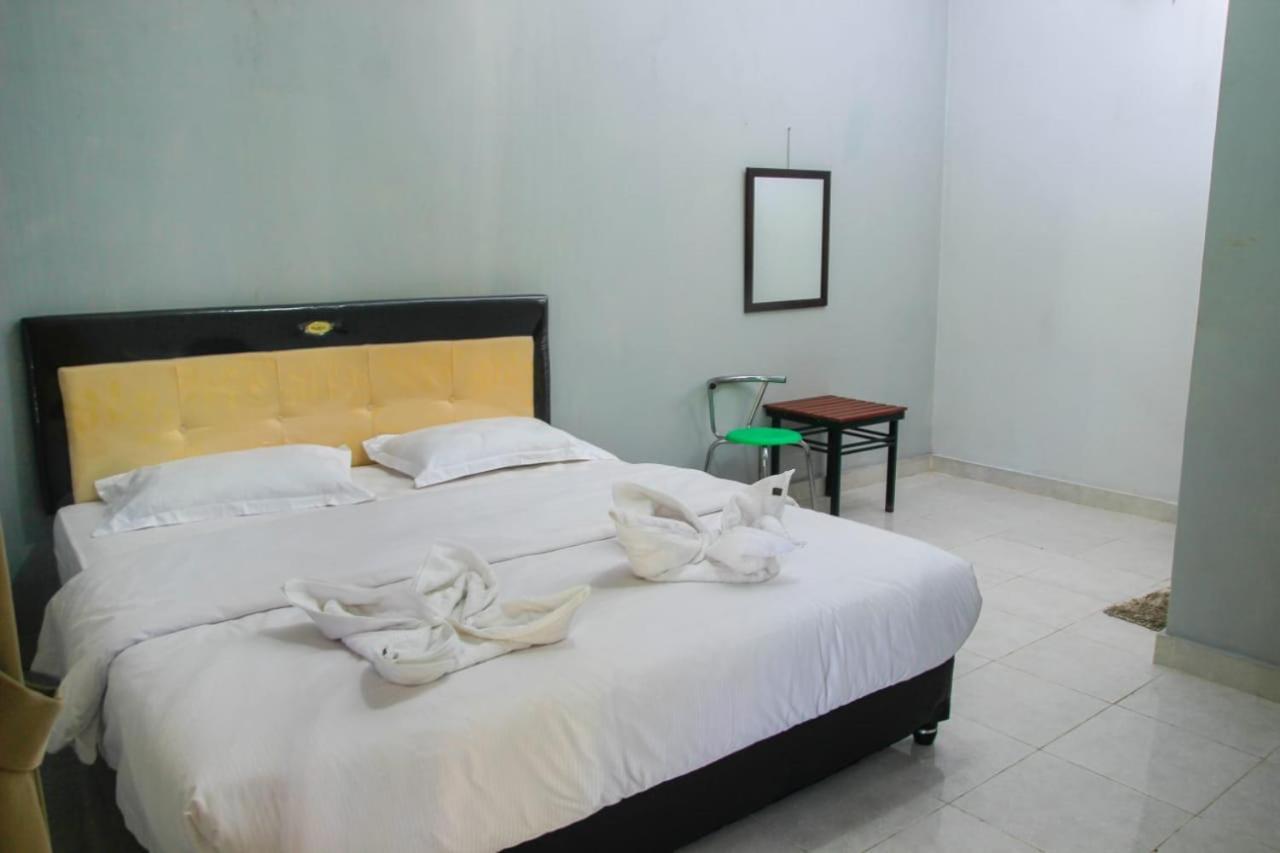 Pondok Wisata Dan Restoran Elim Ваингапу Экстерьер фото